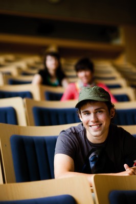 STDK. Happy Student in Lecture Hall