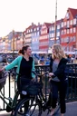 STDK. Girls with bikes in Nyhavn